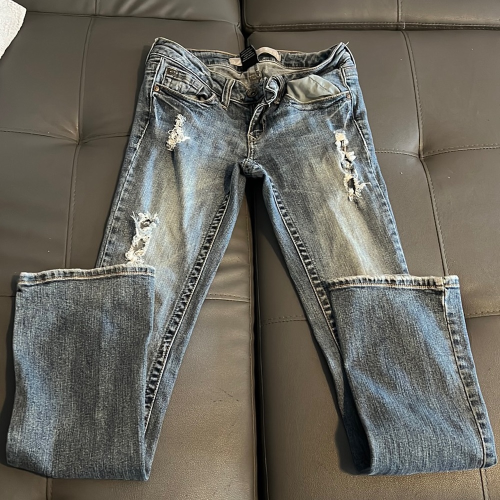 Distressed Blue Jeans